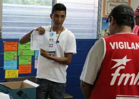 Person Shows Ballot